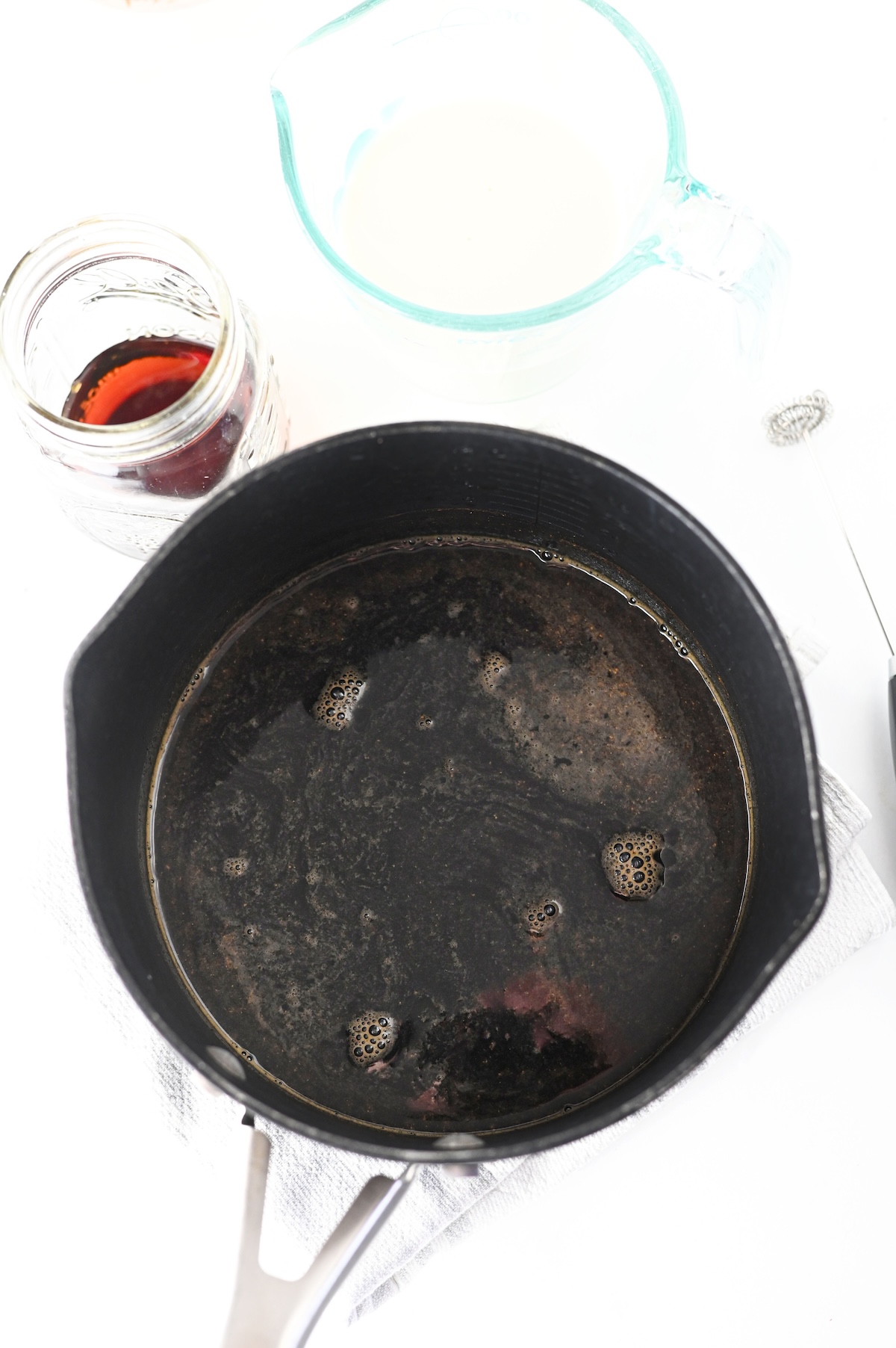 Gingerbread syrup simmering in a saucepan